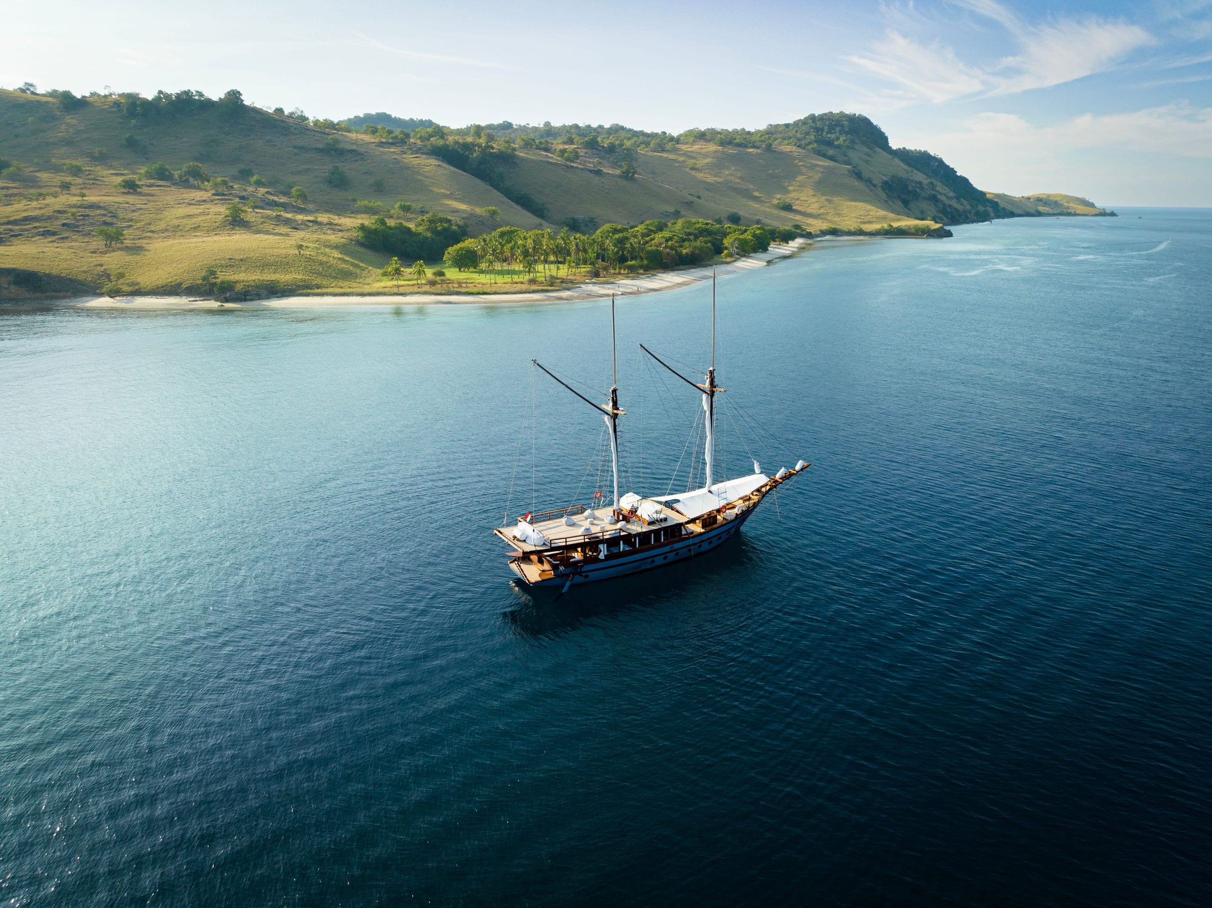 Aerial view over the turquoise lagoons and forested islets of Raja Ampat, Indonesia
