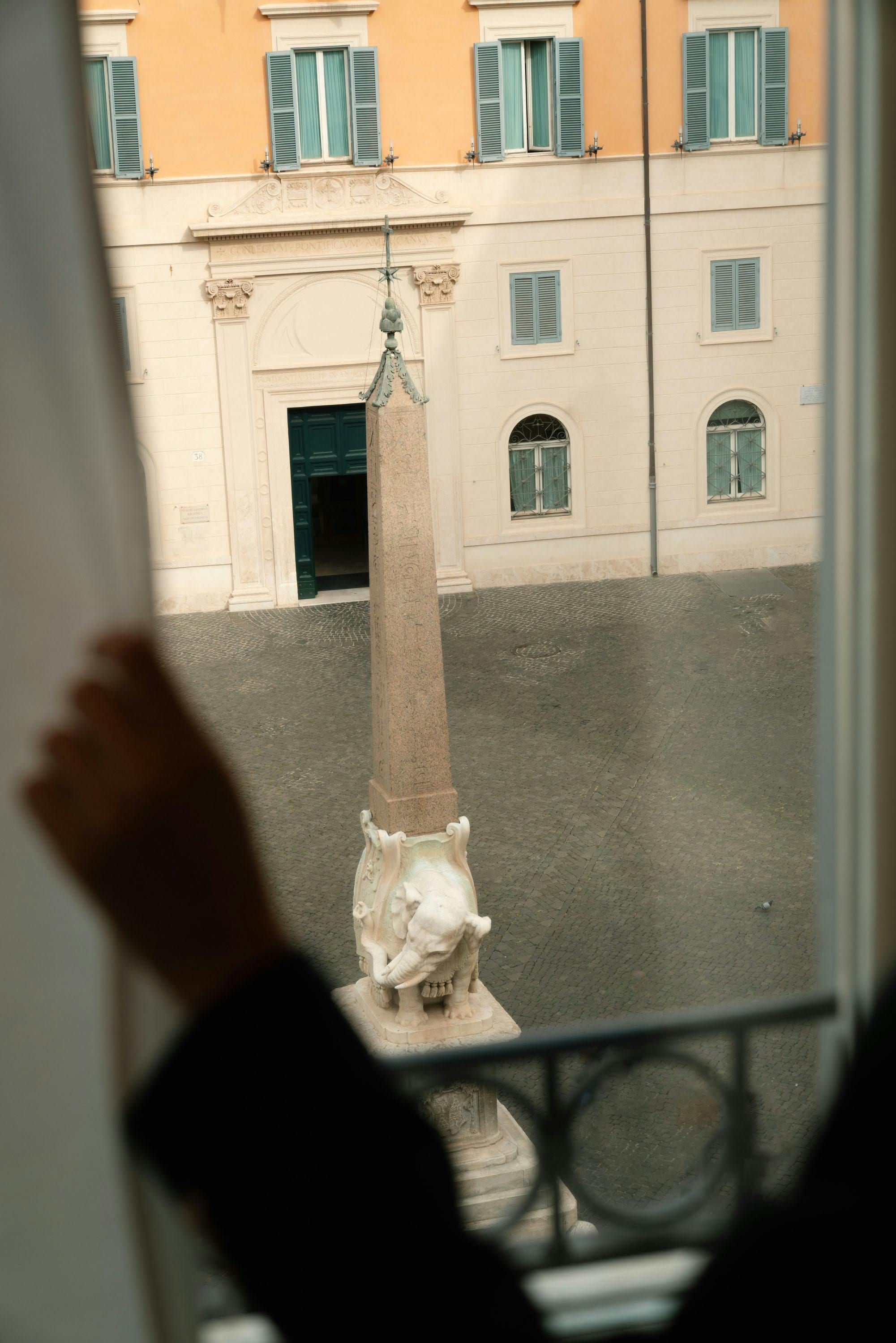 Bernini's elephant and obelisk in Piazza della Minerva seen through a hotel window, Rome